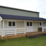 Insulated wooden sports pavilion for tennis