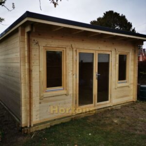 5m x 5m pent roof insulated garden room front with 2 windows and double doors