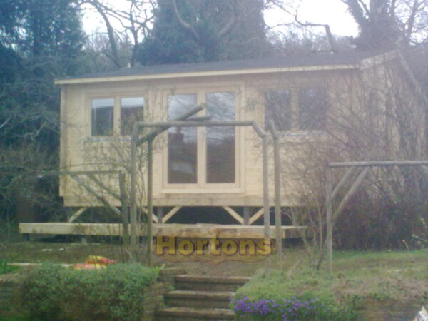 6m x 3m log cabin on sloped garden