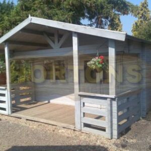 5m x 6.8m garden cabin with large veranda installed in Hortons showsite