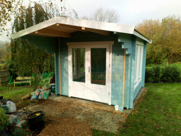 3m x 3m garden cabin installed on concrete base in garden
