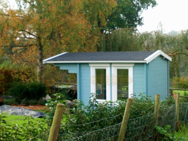 3m x 3m custom garden cabin with tall side windows installed