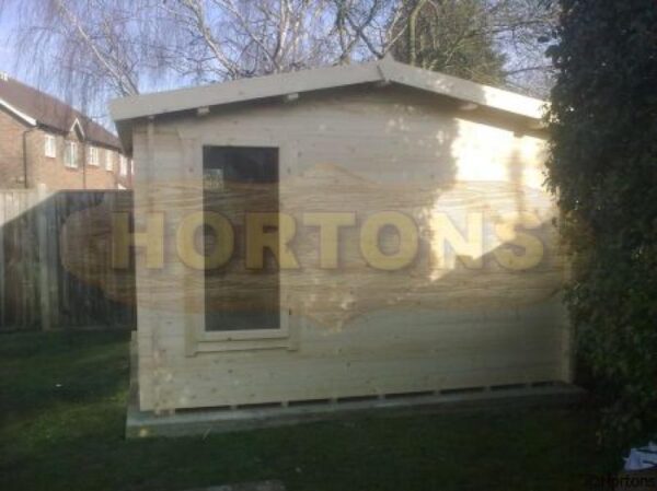 3.5x3.5m log cabin side in garden