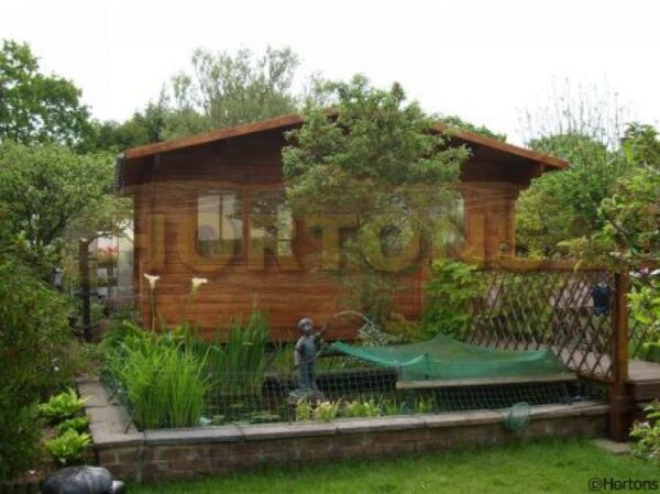 4.5m x 3m log cabin in garden
