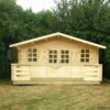 5x4m log cabin with veranda in garden