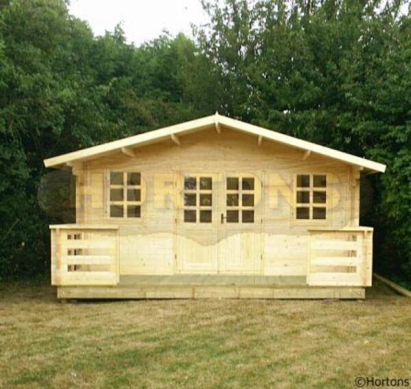 5x4m log cabin with veranda in garden
