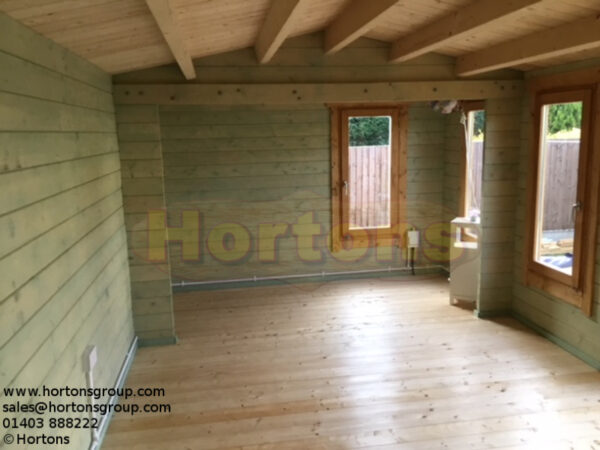 7.5 x 3.5 log cabin garden room internal view with offset archway
