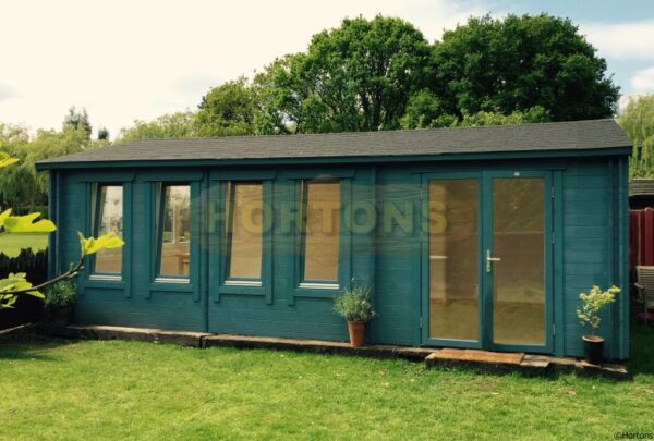 8.5m x 3.5m garden cabin with felt shingle roofing
