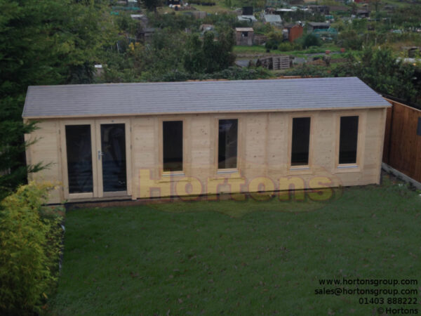 8.5m x 3.5m garden cabin installation complete
