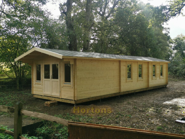 4x12m log cabin on raised timber base