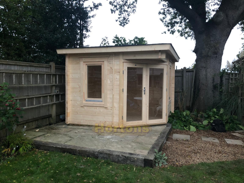 3x3m corner log cabin